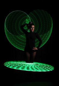 Firmenlogo und LED Hula Hoop Showact